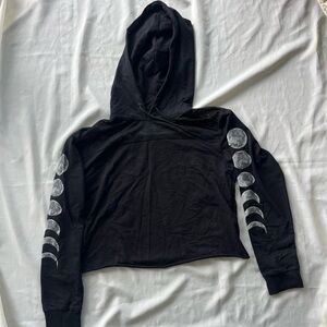 Midnight Hour Black Cropped Hoodie with Drawstring. Moon phases on sleeves.
